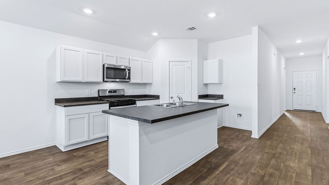 Representative furnished interior of a home built from the The Easton by D.R. Horton in Wayside, Uhland (Image 7).