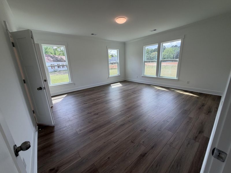 Spacious, unfurnished interior of a new home in Central Estates, Summerville (Image 29).