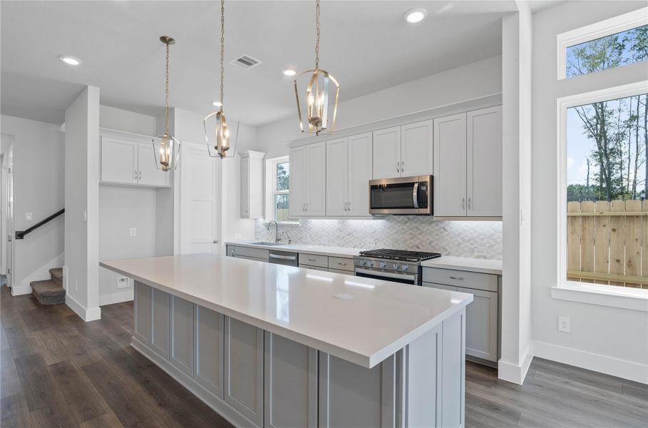 The kitchen is more than just a place to cook; it's a central gathering space designed for creating memories, entertaining guests, and daily living.