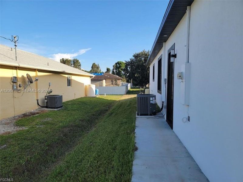 Exterior details and patio area of a home in , Lehigh Acres (Image 3). Exterior details and patio area of a home in , Lehigh Acres (Image 3).