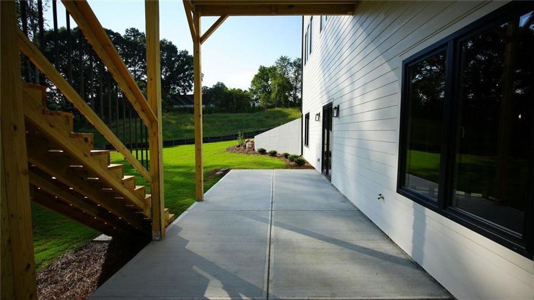 Exterior details and patio area of a home in , Flowery Branch (Image 36).