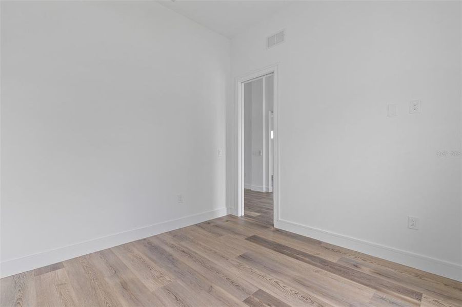 Spacious, unfurnished interior of a new home in , Port Charlotte (Image 26).