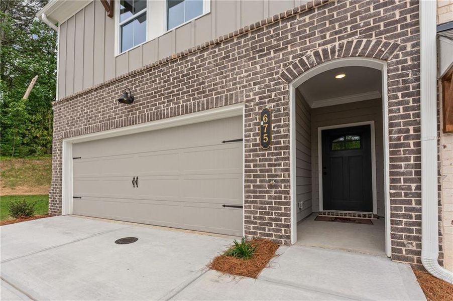 Exterior details and patio area of a home in River Walk Place, Lawrenceville (Image 3).