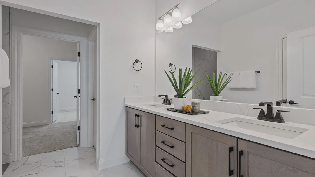 Representative furnished interior of a home built from the Salerno by Epcon Communities in Courtyards by Carrell, Ocean Isle Beach (Image 25).
