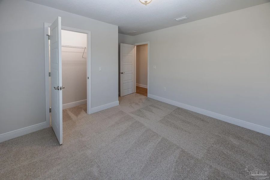 Spacious, unfurnished interior of a new home in Emmaline Gardens, Milton (Image 23).