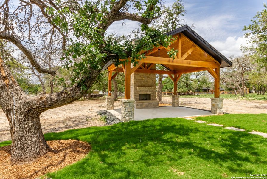Front exterior of a new home in , La Vernia, TX, highlighting curb appeal (Image 31).