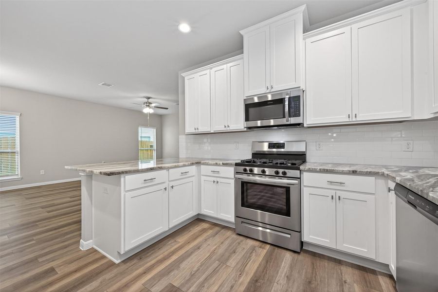 Furnished interior view inside a new home in , Huffman (Image 7).