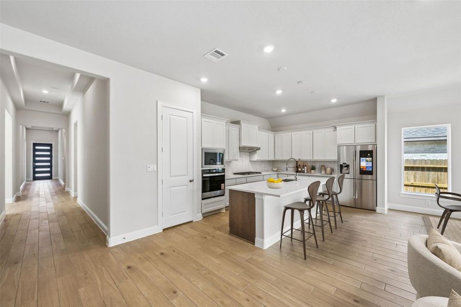 Furnished interior view inside a new home in Woodhavyn 50', Magnolia (Image 6).