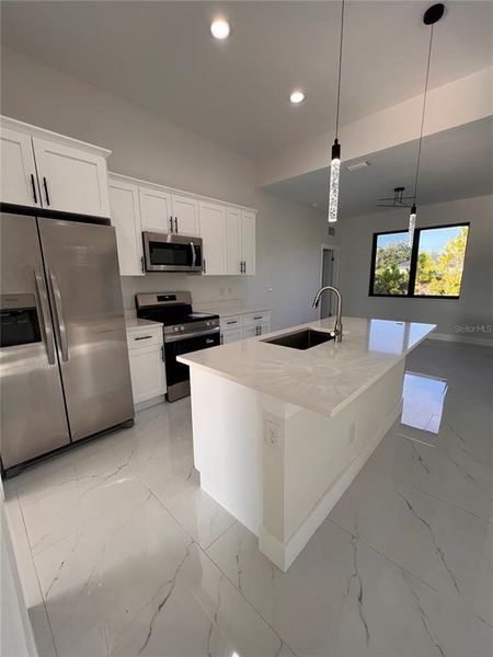 Furnished interior view inside a new home in , Port Charlotte (Image 6). Furnished interior view inside a new home in , Port Charlotte (Image 6).