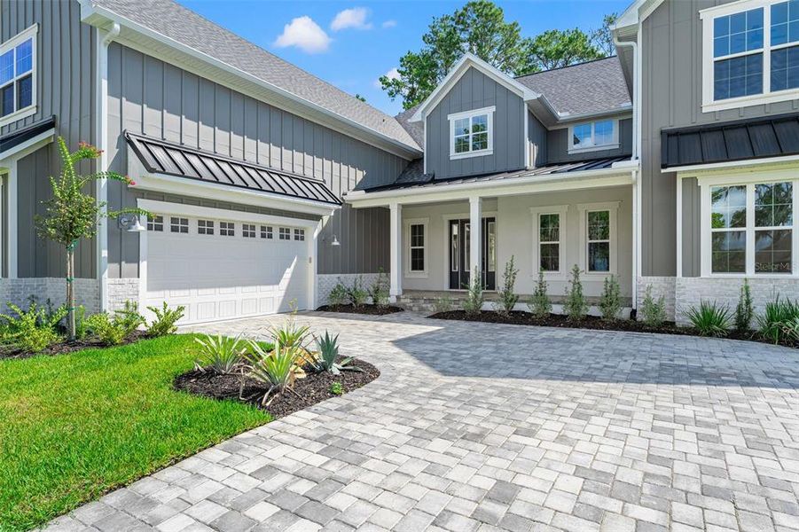 Front exterior of a new home in , Brooksville, FL, highlighting curb appeal (Image 26).