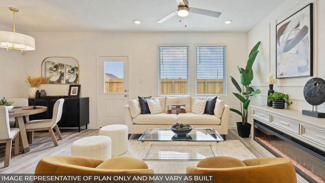 An inviting common area features a linear electric fireplace, providing a warm focal point for relaxation and entertaining. An inviting common area features a linear electric fireplace, providing a warm focal point for relaxation and entertaining.