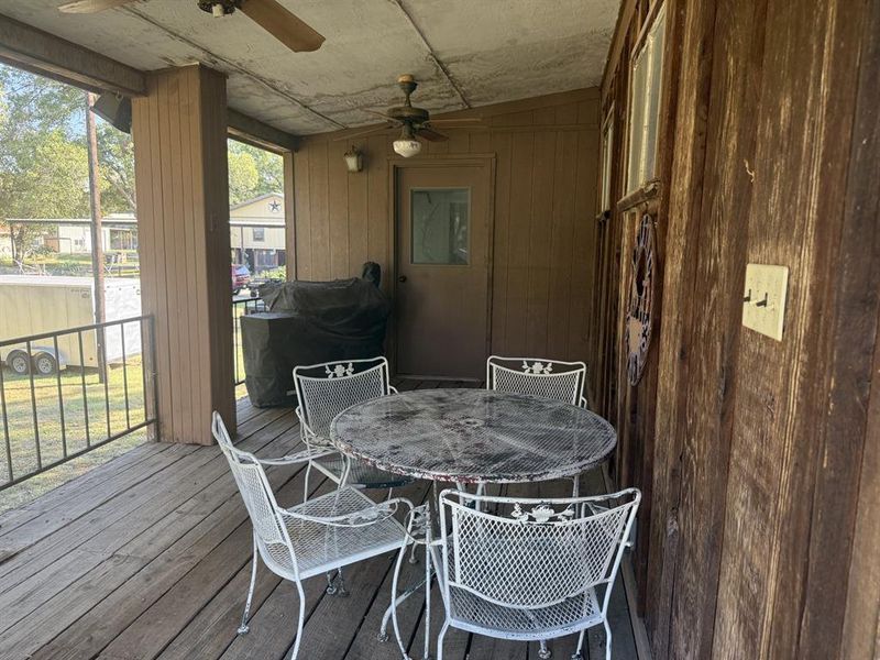 Deck located at back of structure