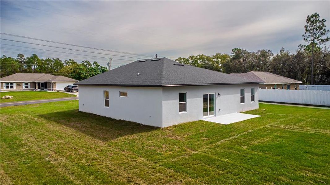 Exterior details and patio area of a home in , Ocala (Image 23).