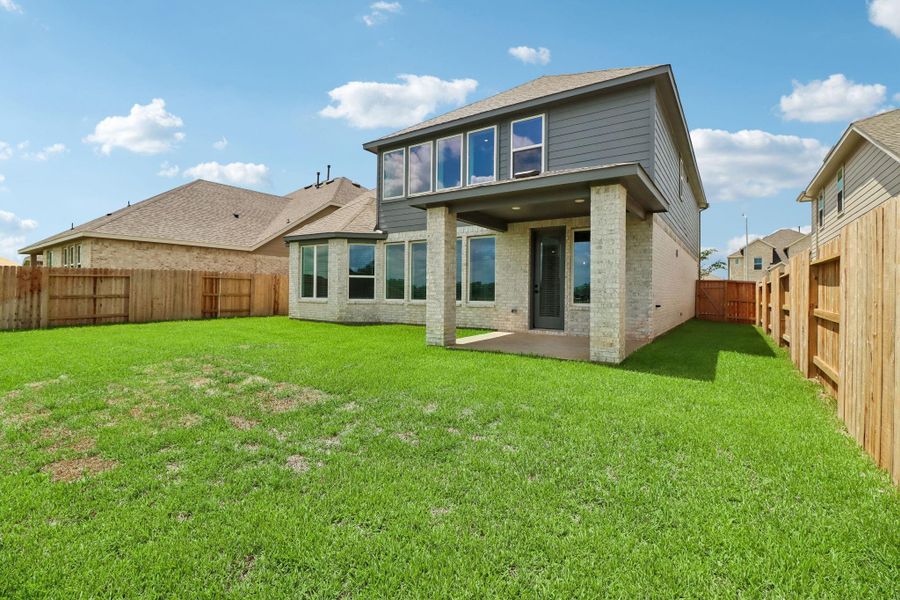 Exterior details and patio area of a home in Kingdom Heights, Rosenberg (Image 4). Exterior details and patio area of a home in Kingdom Heights, Rosenberg (Image 4).
