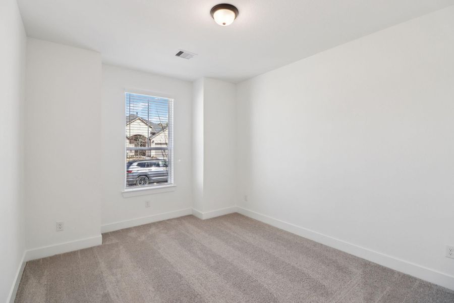 Spacious, unfurnished interior of a new home in The Highlands, Porter (Image 31).