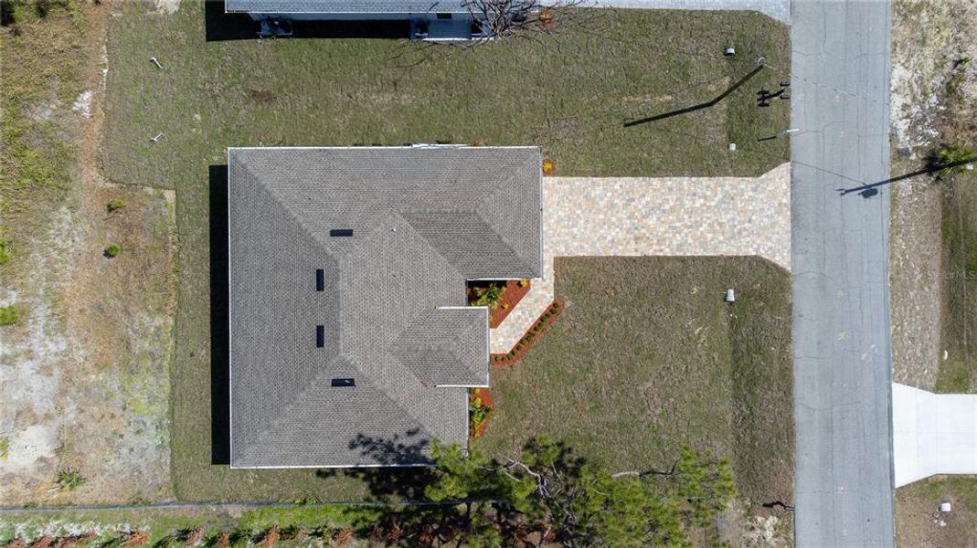 Exterior details and patio area of a home in , North Port (Image 27).