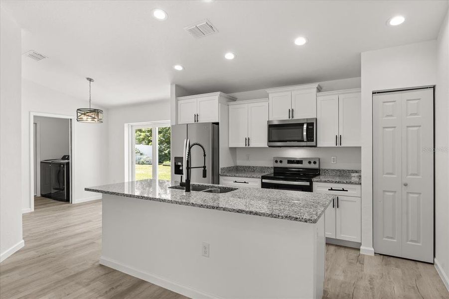Furnished interior view inside a new home in , Dunnellon (Image 5).