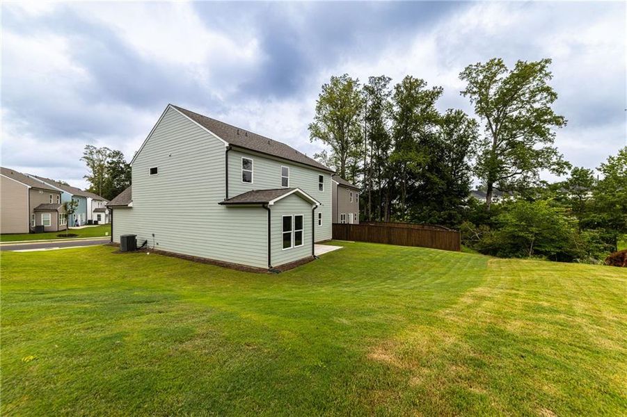Front exterior of a new home in , Canton, GA, highlighting curb appeal (Image 28).