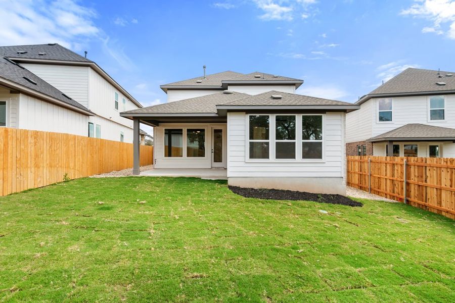 Exterior details and patio area of a home in Terrace Collection at Heritage, Dripping Springs (Image 28).