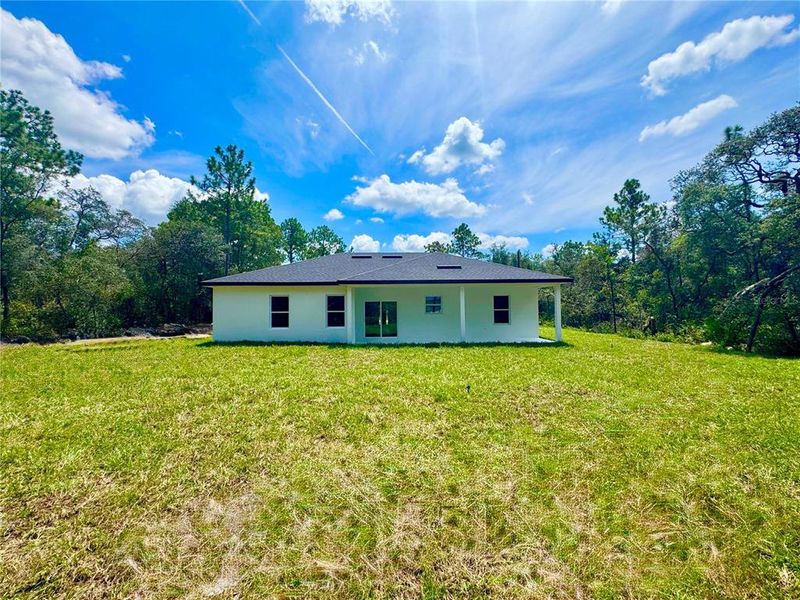 Front exterior of a new home in , Citrus Springs, FL, highlighting curb appeal (Image 16).