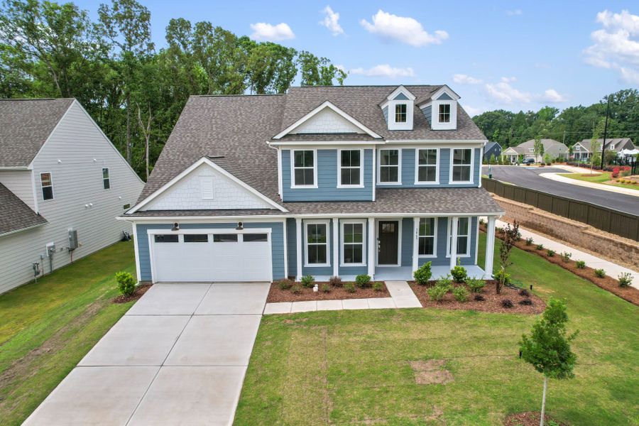 Front exterior of a new home in Kinsdale, Lancaster, SC, highlighting curb appeal (Image 37). Front exterior of a new home in Kinsdale, Lancaster, SC, highlighting curb appeal (Image 37).