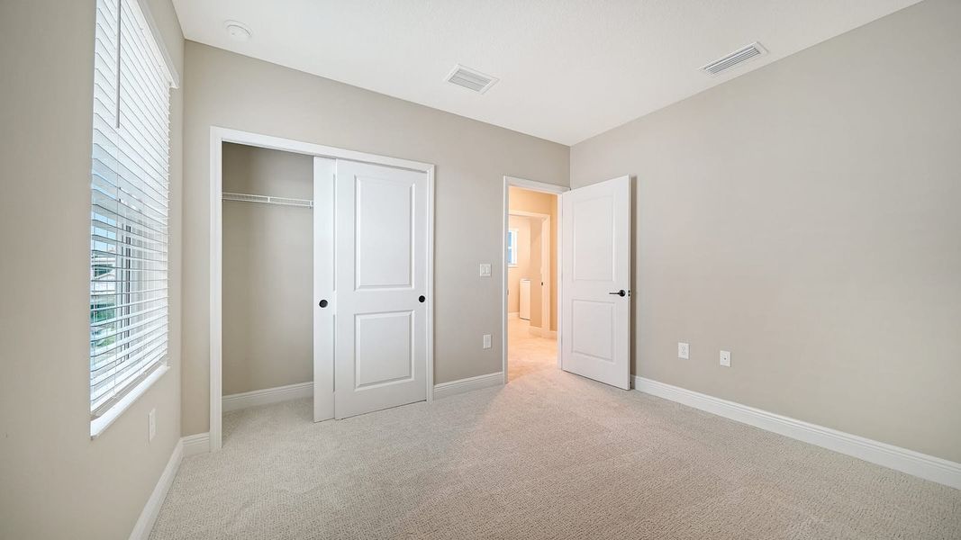 Spacious, unfurnished interior of a new home in Windward Real Estate and Homes for Sale in Sarasota, FL - Neal Communities, Lakewood Ranch (Image 35).