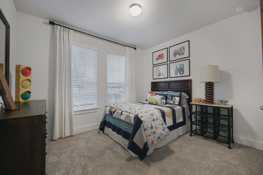 Representative furnished interior of a home built from the Brandy by Chesmar Homes in Buffalo Crossing, Cibolo (Image 19).