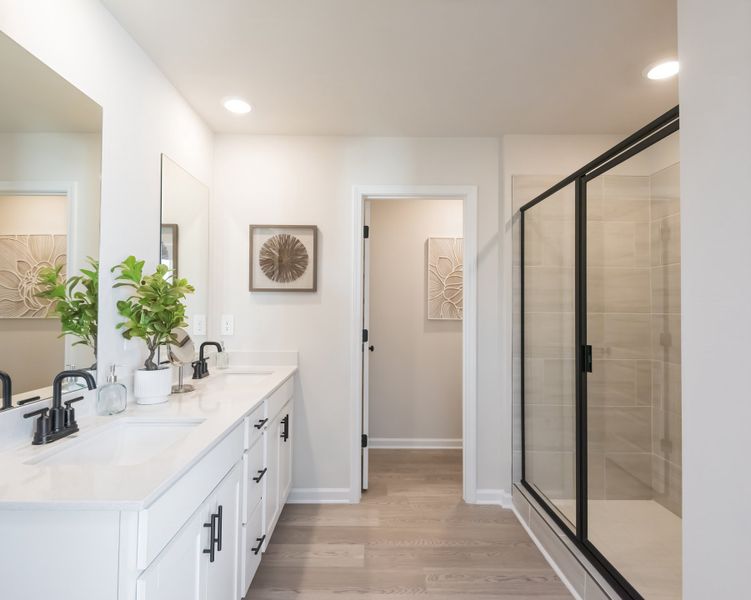 Furnished interior view inside a new home in Vines at Mill Creek - Estate Series, Braselton (Image 16).