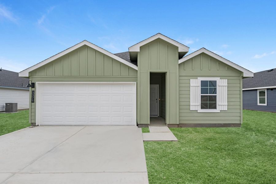 Front exterior of a new home in Reserve at Mallard Lakes, Orange, TX, highlighting curb appeal (Image 13). Front exterior of a new home in Reserve at Mallard Lakes, Orange, TX, highlighting curb appeal (Image 13).