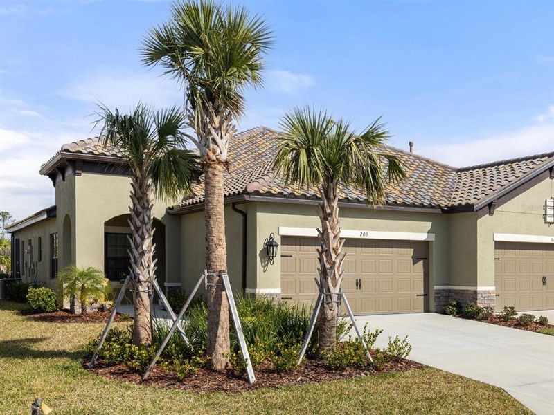 Front exterior of a new home in , Nokomis, FL, highlighting curb appeal (Image 1).