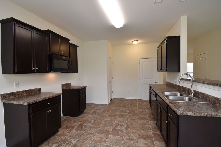 Representative furnished interior of a home built from the Irvine by Keystone Homes NC in The Wilcox, Greensboro (Image 18).