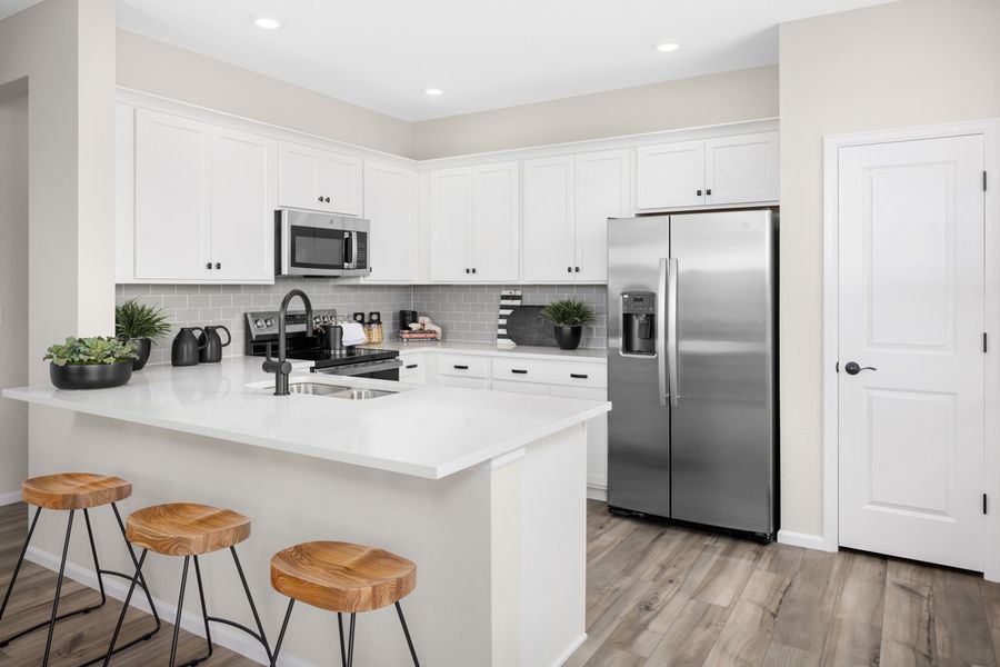 Representative furnished interior of a home built from the 2212 by Risewell Homes in Windler, Aurora (Image 4).