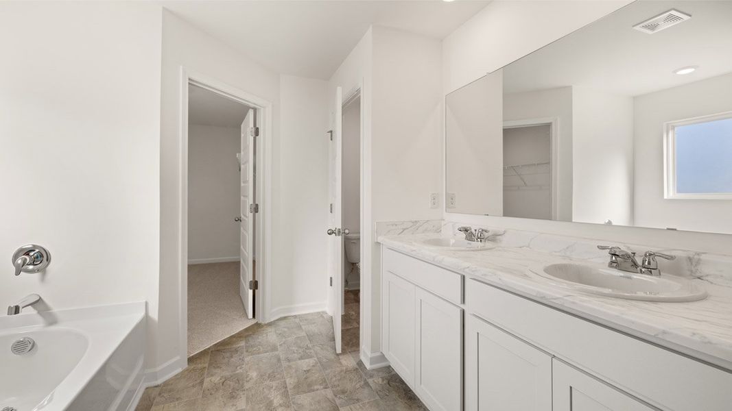 Representative unfurnished interior of a home built from the Mansfield by D.R. Horton in Brooks Station, Dacula (Image 20).