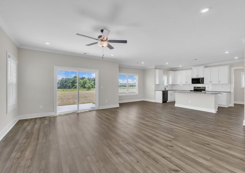 Sliding doors open to the backyard.