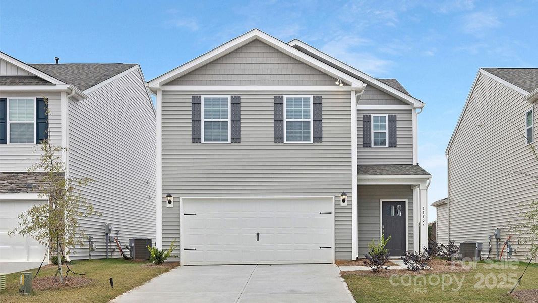 Front exterior of a new home in Zion Springs, Hickory, NC, highlighting curb appeal (Image 1).