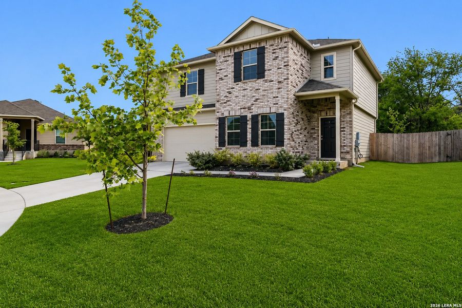 Front exterior of a new home in Greenfield, New Berlin, TX, highlighting curb appeal (Image 2). Front exterior of a new home in Greenfield, New Berlin, TX, highlighting curb appeal (Image 2).
