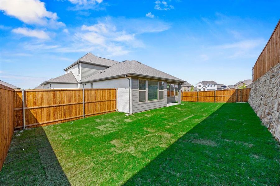 Front exterior of a new home in Tinsley Meadows, Van Alstyne, TX, highlighting curb appeal (Image 16). Front exterior of a new home in Tinsley Meadows, Van Alstyne, TX, highlighting curb appeal (Image 16).