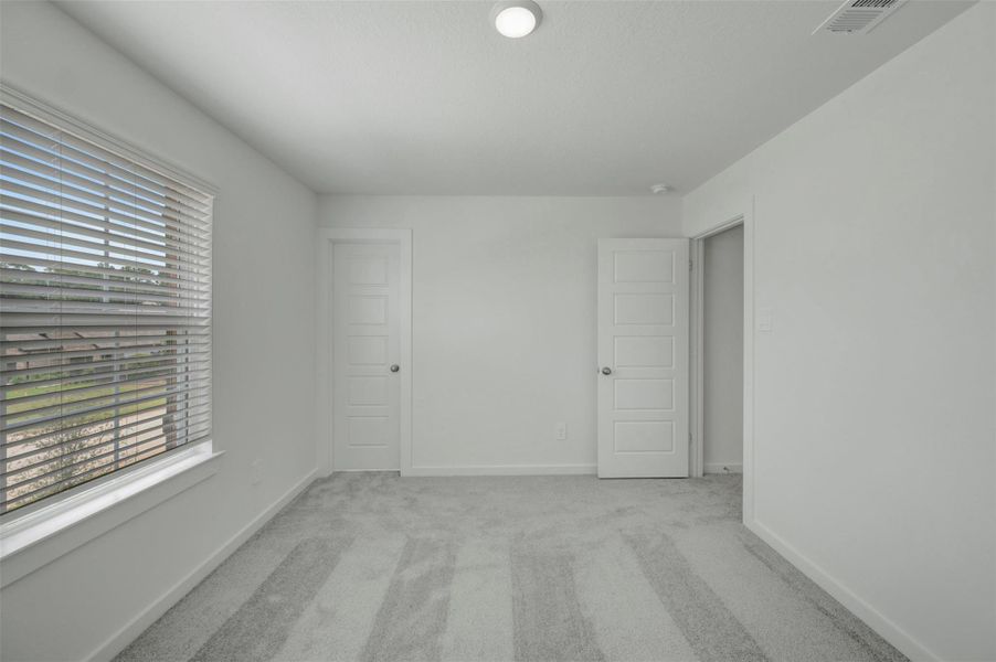 Spacious, unfurnished interior of a new home in Pinewood at Grand Texas, New Caney (Image 10). Spacious, unfurnished interior of a new home in Pinewood at Grand Texas, New Caney (Image 10).