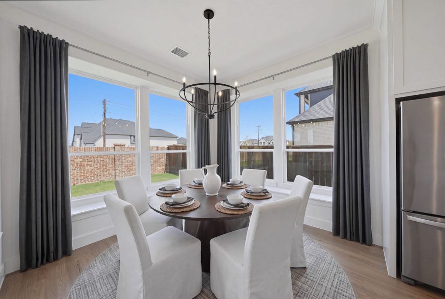Furnished interior view inside a new home in Estates at Rockhill, Frisco (Image 29).