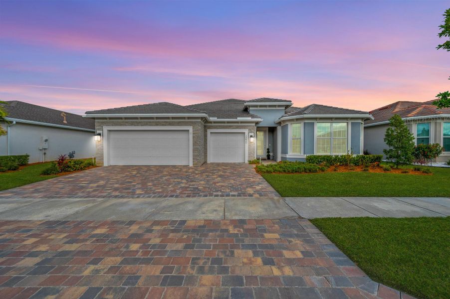Front exterior of a new home in , Port St. Lucie, FL, highlighting curb appeal (Image 1). Front exterior of a new home in , Port St. Lucie, FL, highlighting curb appeal (Image 1).
