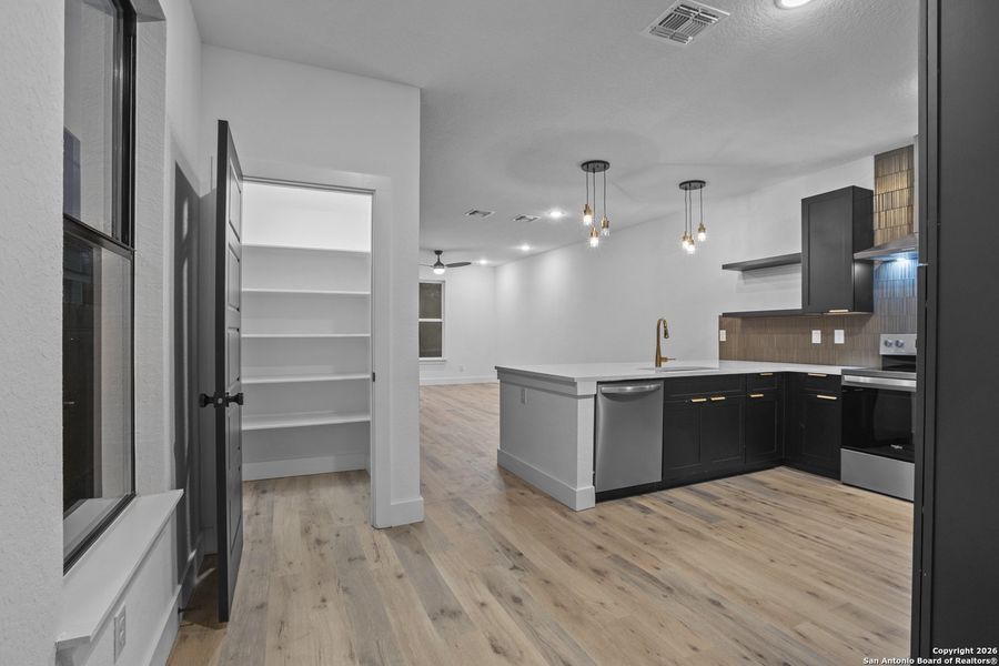 Furnished interior view inside a new home in , San Antonio (Image 6).