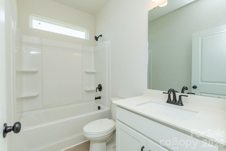Furnished interior view inside a new home in Sunset Meadows, Charlotte (Image 7).