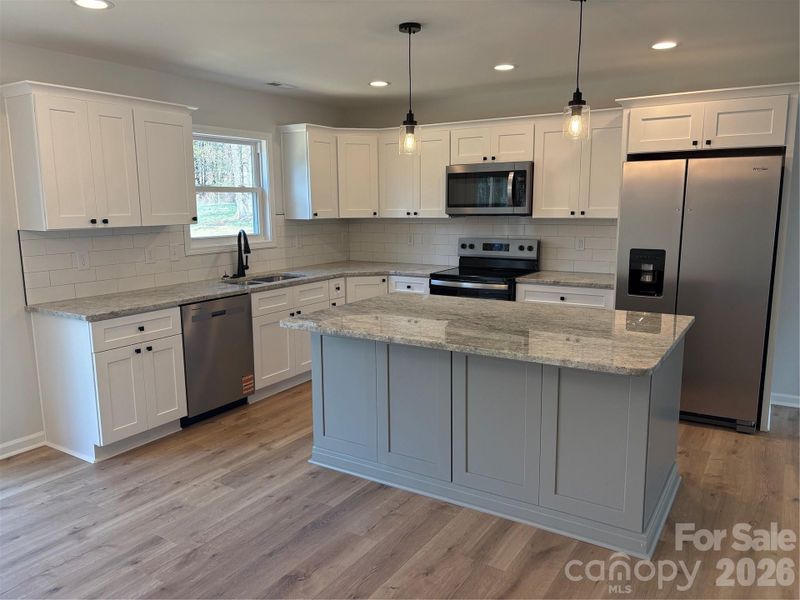 Furnished interior view inside a new home in , Statesville (Image 3).
