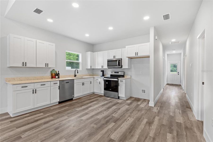 Kitchen with stainless-steel appliances