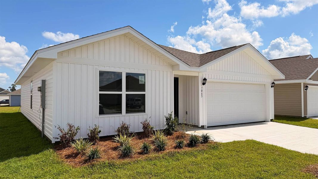 Front exterior of a new home in Liberty, Panama City, FL, highlighting curb appeal (Image 2). Front exterior of a new home in Liberty, Panama City, FL, highlighting curb appeal (Image 2).