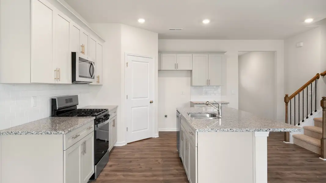 Furnished interior view inside a new home in The Reserve at Prestleigh, Wake Forest (Image 9).