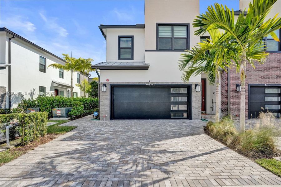 Front exterior of a new home in , Plantation, FL, highlighting curb appeal (Image 27).