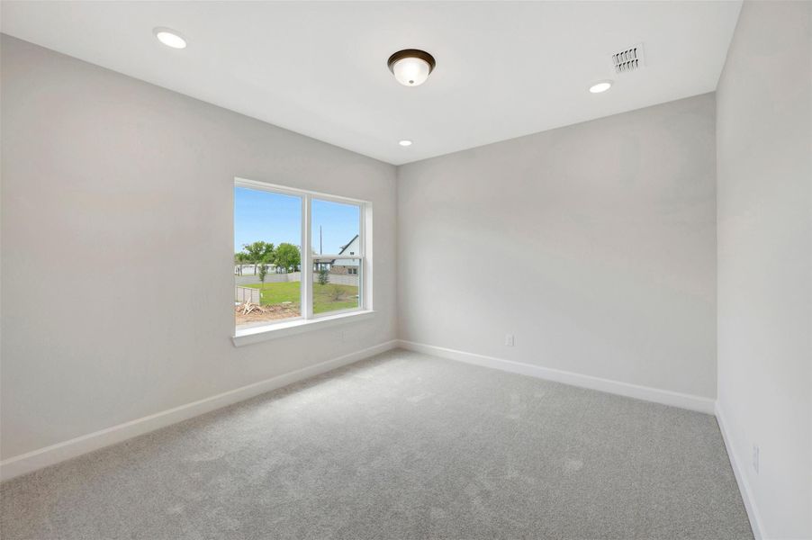 Spacious, unfurnished interior of a new home in Pomona - Grove Row Collection, Manvel (Image 13).
