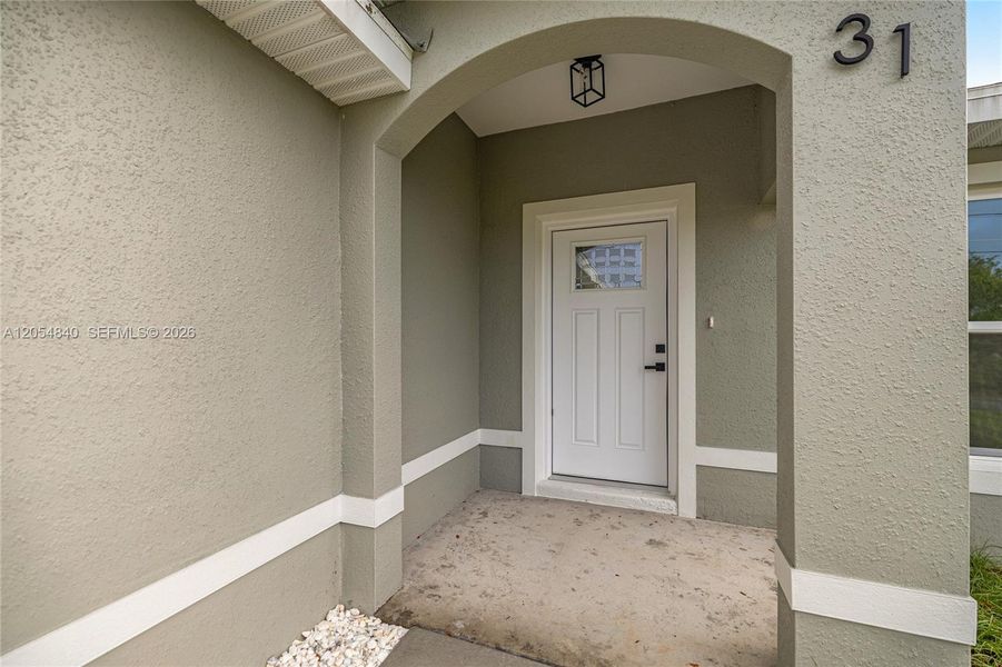 Exterior details and patio area of a home in , Ocala (Image 3).