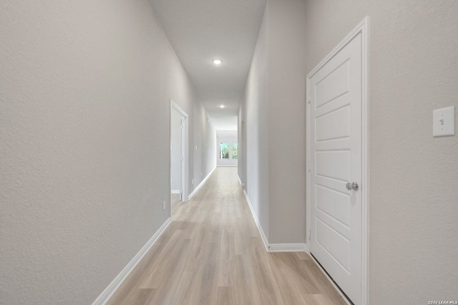 Spacious, unfurnished interior of a new home in Chaparral Ranch, Floresville (Image 22).